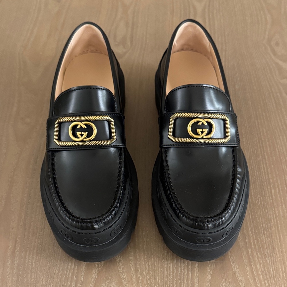 Gucci Black Leather Loafers with Gold Emblem